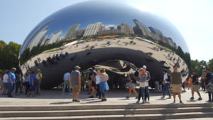 Cloud Gate, nicknamed The Bean, is a popular attraction for tourists visiting Downtown Chicago